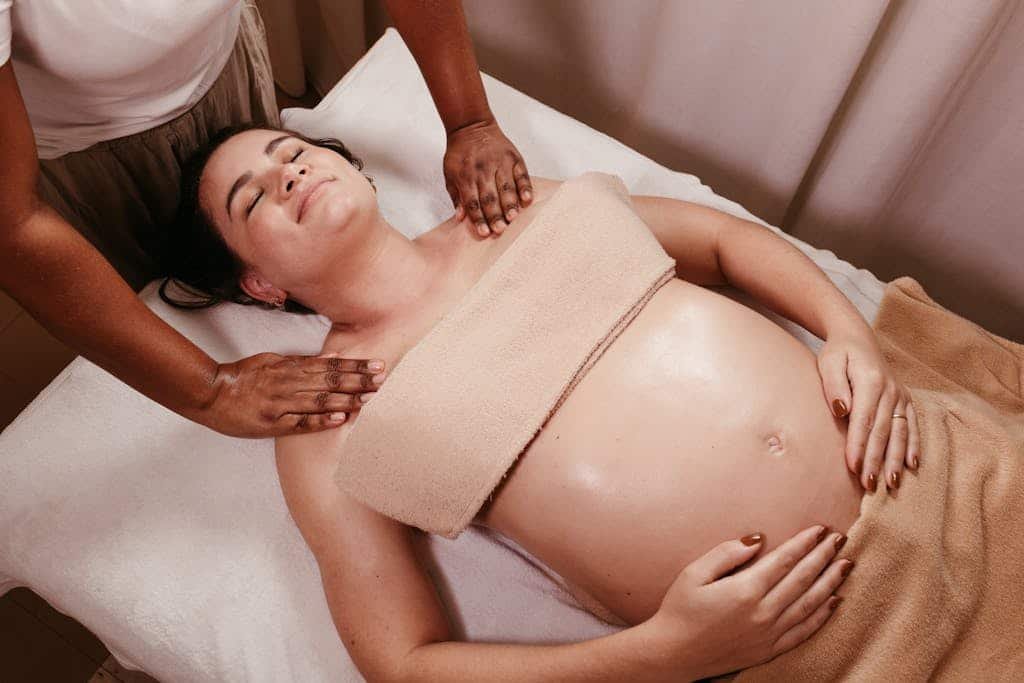 Pregnant Woman Relaxing in a Massage Parlour