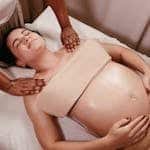 Pregnant Woman Relaxing in a Massage Parlour