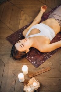 Woman Relaxing in Yoga Mat